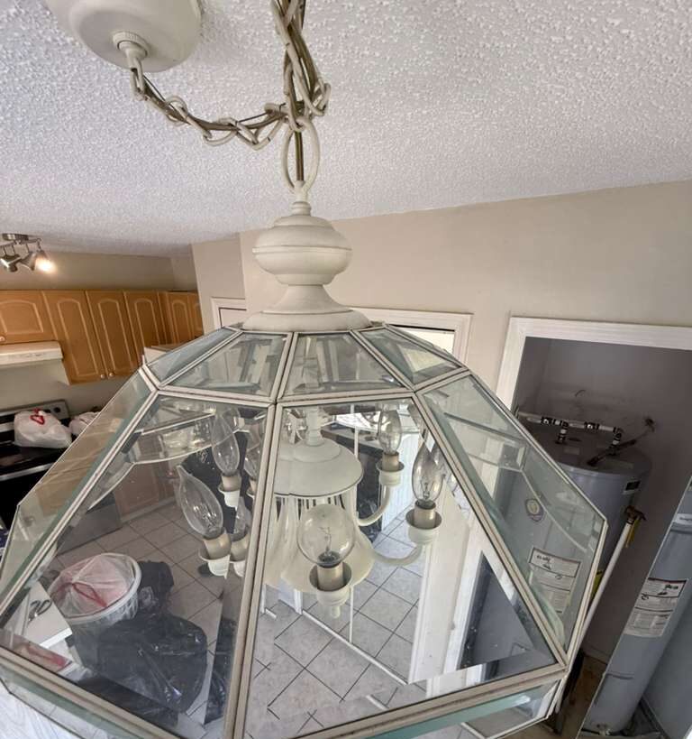 After: chandelier & light fixtures after a Go2 Workers deep cleaning in Winter Park, FL