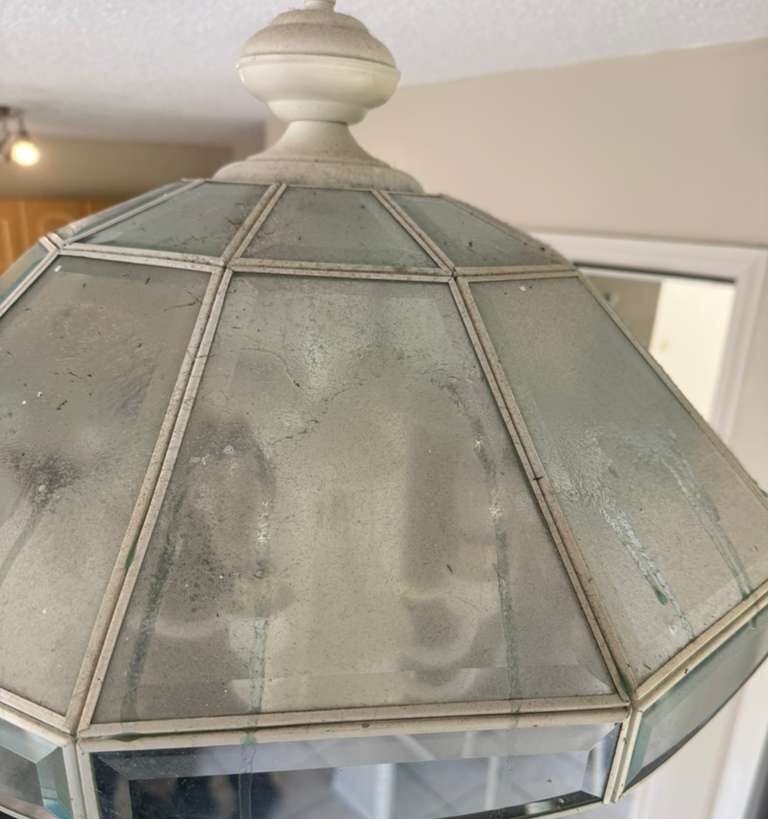 Before: chandelier & light fixtures before a Go2 Workers deep cleaning in Winter Park, FL