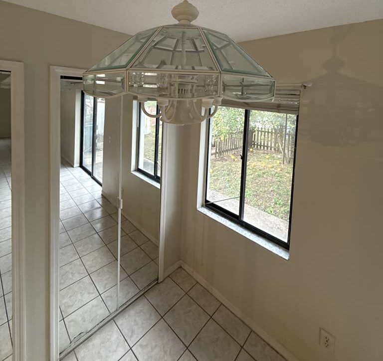 Dining area — Fixture detailed, floors polished, surfaces dusted. Go2 Workers deep cleaning, Winter Park, FL