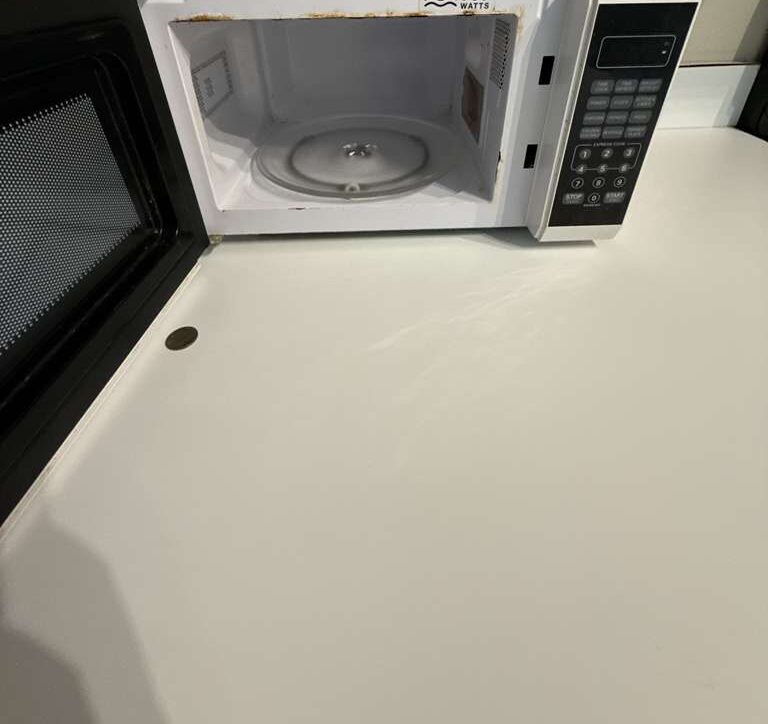 Microwave interior — Inside and out — no grease film left behind. Go2 Workers deep cleaning, Winter Park, FL