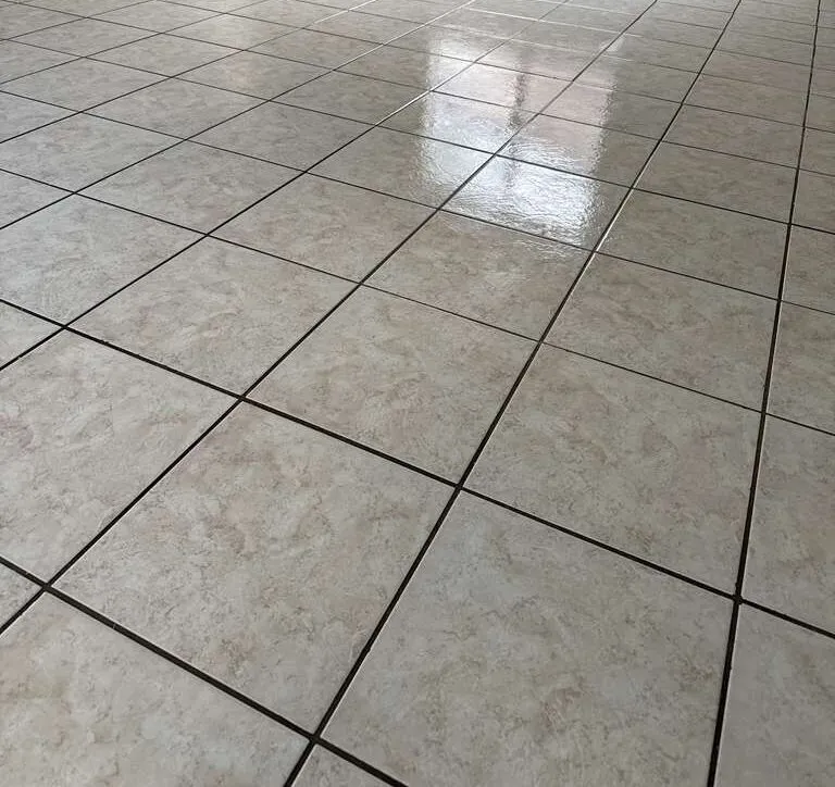 After: tile floor & grout in a Winter Park home after a Go2 Workers deep cleaning